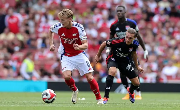 Martin Odegaard of Arsenal runs with the ball