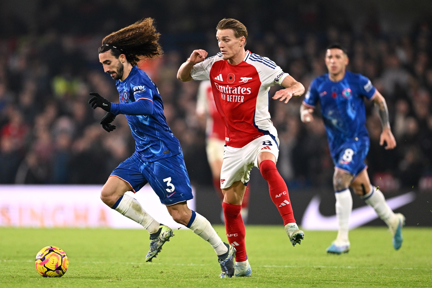  Marc Cucurella of Chelsea gets past Martin Odegaard