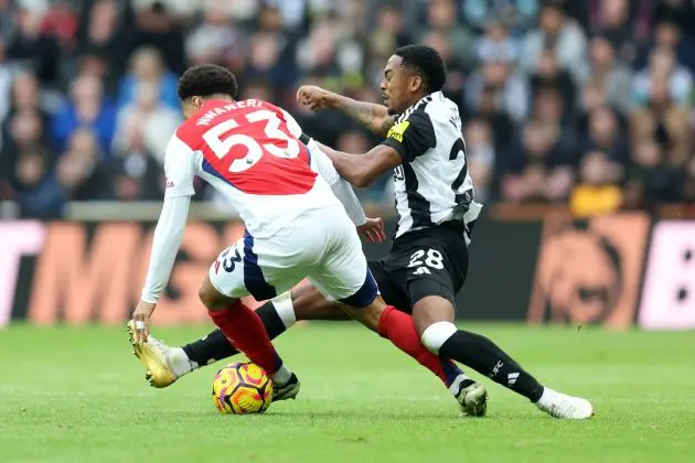 Joe Willock of Newcastle United fouls Ethan Nwaneri of Arsenal