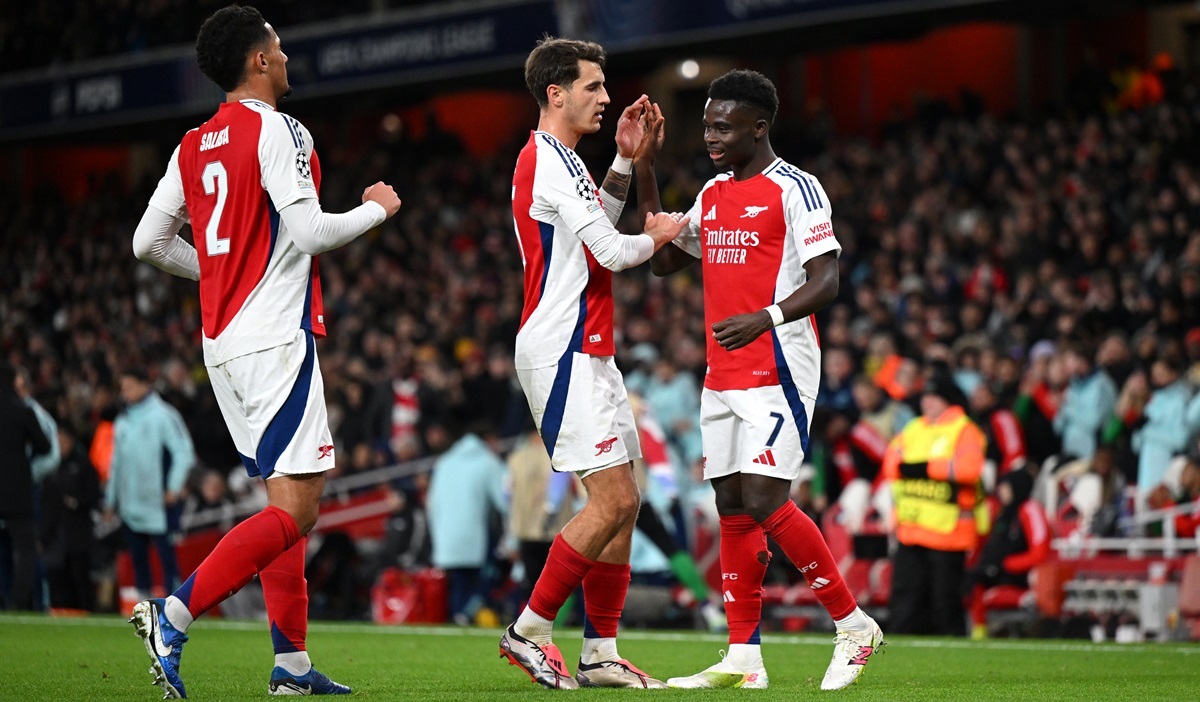 Saka celebrating goal against Monaco with Saliba and Kiwior