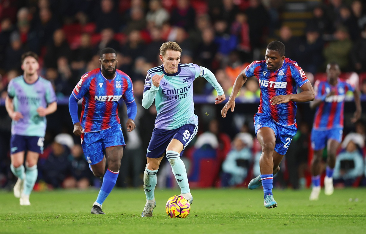 Martin Odegaard of Arsenal runs with the ball during the Premier League match between Crystal Palace FC and Arsenal FC