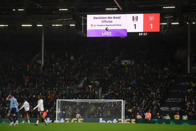 The LED screen displays a message from VAR which reads ""Decision No Goal, Offside, 11, Teodoro Martinelli Silva" during the Premier League match between Fulham FC and Arsenal FC
