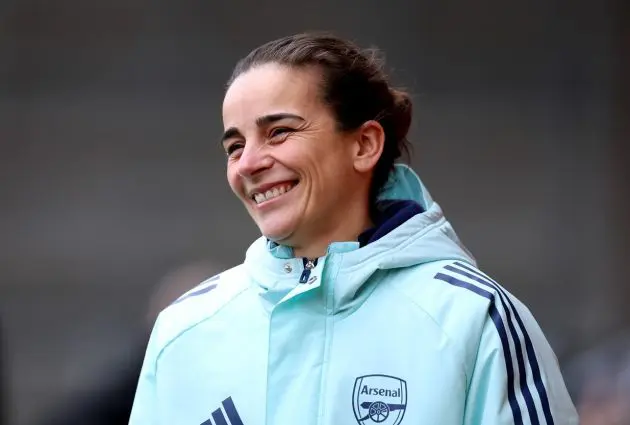 Renee Slegers, Interim Manager of Arsenal, smiles as she looks on prior to the Barclays Women's Super League match between Liverpool and Arsenal