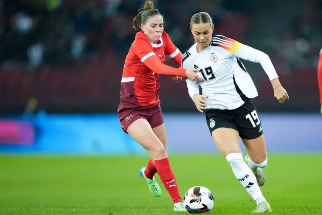 Smilla Vallotto of Switzerland (L) and Klara Bühl of Germany battle for the ball