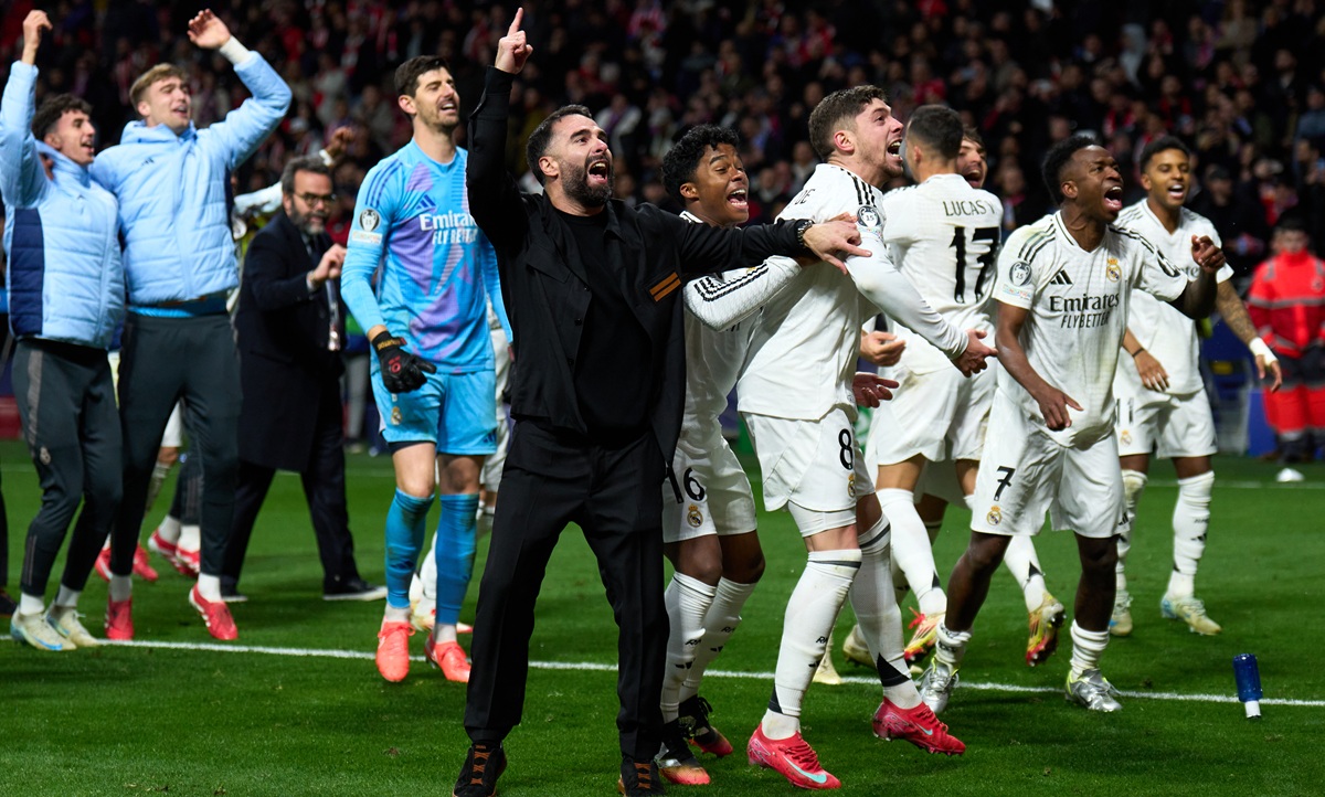 Real Madrid celebrating after beating Atletico Madrid