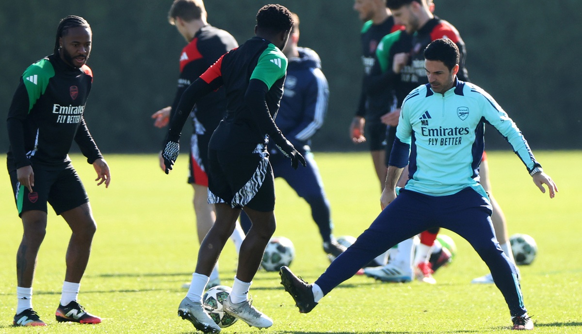 Nathan Butler-Oyedeji with Mikel Arteta